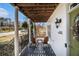 Relaxing front porch with chairs and a porch swing, perfect for enjoying the outdoors at 2531 Paul Nw Ave, Atlanta, GA 30318