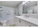 Modern bathroom with white cabinets, granite counters, a glass enclosed shower, and luxurious fixtures at 2930 Monticello Dr, Cumming, GA 30041