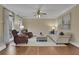 Comfortable living room with fireplace, sitting chairs, and neutral decor at 2930 Monticello Dr, Cumming, GA 30041