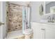 Bathroom features a tiled shower, modern vanity, and neutral paint, creating a serene space at 3197 Church St, Atlanta, GA 30344