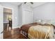 Inviting bedroom with hardwood floors and large closet is conveniently located near the dining room at 3197 Church St, Atlanta, GA 30344