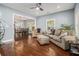 Spacious living room with hardwood floors and open access to the dining area at 3197 Church St, Atlanta, GA 30344