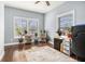 Bright office with hardwood floors and large windows provides an efficient work area at 3197 Church St, Atlanta, GA 30344