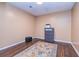 Bedroom with dark wood floors and neutral walls at 409 Hunting Ridge Way, Ellenwood, GA 30294