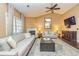 Spacious living room with fireplace and vaulted ceiling at 409 Hunting Ridge Way, Ellenwood, GA 30294