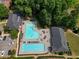 A captivating aerial shot of the community pool area, highlighting ample seating and well-kept facilities at 4406 Kendall Way, Roswell, GA 30075