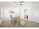 Bright bedroom featuring a desk and chair with a ceiling fan at 4406 Kendall Way, Roswell, GA 30075
