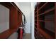 Custom walk-in closet with ample shelving, hanging space, and a clean, organized layout at 4406 Kendall Way, Roswell, GA 30075