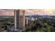 High-rise condominium with lush greenery and a pool in an upscale urban setting at 2660 Peachtree Nw Rd # 26F, Atlanta, GA 30305