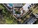 A gorgeous aerial view of the property's green space, parking and community pool at 2660 Peachtree Nw Rd # 26F, Atlanta, GA 30305