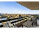 Relaxing balcony with comfortable seating area and expansive city views at 2660 Peachtree Nw Rd # 26F, Atlanta, GA 30305