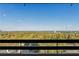 Enjoy the stunning city and lush green views from this apartment balcony at 2660 Peachtree Nw Rd # 26F, Atlanta, GA 30305