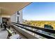 Relax on the spacious balcony with a beautiful view of the city and surrounding greenery at 2660 Peachtree Nw Rd # 26F, Atlanta, GA 30305