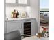 Elegant bar area with marble countertops and wine storage at 2660 Peachtree Nw Rd # 26F, Atlanta, GA 30305