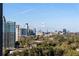 Expansive city view showcasing the skyline and lush greenery at 2660 Peachtree Nw Rd # 26F, Atlanta, GA 30305
