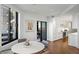 Dining area open to the kitchen with modern finishes and natural light at 2660 Peachtree Nw Rd # 26F, Atlanta, GA 30305
