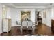 Open concept dining room with modern furnishings and beautiful hardwood floors at 2660 Peachtree Nw Rd # 26F, Atlanta, GA 30305