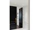 Elegant entrance showcasing black double doors with gold hardware and white trim at 2660 Peachtree Nw Rd # 26F, Atlanta, GA 30305