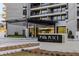 Welcoming building entrance with clear signage and manicured landscaping, offering great curb appeal at 2660 Peachtree Nw Rd # 26F, Atlanta, GA 30305
