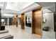 Elegant hallway featuring mirrors and neutral decor, providing a clean and modern design at 2660 Peachtree Nw Rd # 26F, Atlanta, GA 30305
