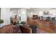 Spacious living area with stylish seating, hardwood flooring, and modern decor at 2660 Peachtree Nw Rd # 26F, Atlanta, GA 30305