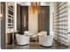 Bright and airy lounge area with modern decor, ideal for relaxing and socializing at 2660 Peachtree Nw Rd # 26F, Atlanta, GA 30305