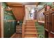 Cozy staircase with green walls and wooden steps at 5494 Princeton Oaks Ln, Sugar Hill, GA 30518