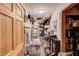 Functional storage room with shelving, vacuum, tile, and ample space for organization and storage at 5494 Princeton Oaks Ln, Sugar Hill, GA 30518