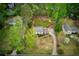 Aerial perspective of a charming home situated on a well-maintained lot with mature trees at 240 Pinebrook Way, Roswell, GA 30076