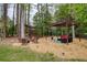 Outdoor pergola seating area with comfortable seating, perfect for entertaining and relaxation at 240 Pinebrook Way, Roswell, GA 30076