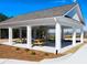 Exterior community gazebo with picnic tables at 8227 Coldstream Dr, Fairburn, GA 30213