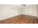 Bright and airy bedroom with large windows and neutral wall color at 7127 Riverside Dr, Atlanta, GA 30328