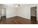 Bedroom with hardwood floors, ceiling fan, and closet at 7127 Riverside Dr, Atlanta, GA 30328