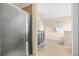 Bathroom featuring a glass enclosed shower, light tile flooring, and granite countertop on the vanity at 5143 Olive Branch Cir, Powder Springs, GA 30127