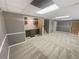 Finished basement with a wet bar, built-in cabinets, and carpet flooring at 724 Dukehart Ct, Stone Mountain, GA 30083