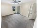 Bedroom with neutral carpet and window, a peaceful retreat ready for personalization at 724 Dukehart Ct, Stone Mountain, GA 30083