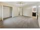 Main bedroom with an ensuite bathroom, a closet, and plush carpet flooring at 724 Dukehart Ct, Stone Mountain, GA 30083
