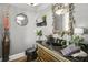 Stylish powder room featuring modern fixtures, elegant decor, and a sleek vanity at 90 W Peachtree St, Norcross, GA 30071
