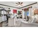 Bright home office with a desk, chair, shelving, daybed, and natural light at 90 W Peachtree St, Norcross, GA 30071