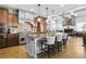 Gourmet kitchen featuring a large island, stainless steel appliances, and custom cabinetry at 90 W Peachtree St, Norcross, GA 30071