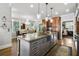 Gorgeous kitchen featuring granite countertops, custom cabinets, and modern stainless steel appliances at 90 W Peachtree St, Norcross, GA 30071
