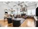 Spacious living room with coffered ceilings, a fireplace, and ample natural light at 90 W Peachtree St, Norcross, GA 30071
