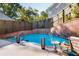 Backyard pool with a clear view of the house and relaxing surroundings at 90 W Peachtree St, Norcross, GA 30071