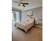Serene bedroom with soft carpet, soft natural light, and space for relaxation at 1194 John Collier Rd, Atlanta, GA 30318