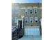 Charming brick townhome with a two car garage and classic architectural details at 1194 John Collier Rd, Atlanta, GA 30318