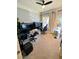 Bright home office with multiple monitors, ceiling fan, and natural light at 1194 John Collier Rd, Atlanta, GA 30318