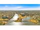 Scenic aerial shot of a lake community, highlighting the golf course, clubhouse, and waterfront homes at 2445 Ridgelake Dr, Villa Rica, GA 30180