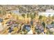 Community view, showcasing homes with water views and mature trees at 2445 Ridgelake Dr, Villa Rica, GA 30180