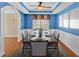Beautiful dining room with a long wood table and stylish decor at 2445 Ridgelake Dr, Villa Rica, GA 30180