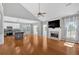Open living room with a fireplace and views of the backyard at 2445 Ridgelake Dr, Villa Rica, GA 30180